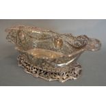 A Chester Silver Oval Bowl of Pierced Form decorated Bows and Swags, 21 cms long,