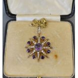 An Edwardian Yellow Metal Star Form Pendant Brooch set with amethyst and pearls together with a