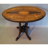 A Victorian Walnut Marquetry Inlaid Oval Centre Table with quadruple supports and outswept legs,