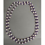 A Cultured Pearl and Amethyst Bead Necklace