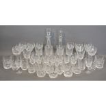 A Large Collection of Waterford Cut Glass, to include two decanters with stoppers, wine glasses,