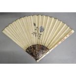 An 18th Century Chinoiserie Decorated Tortoiseshell Fan with Pierced Ivory Guards,