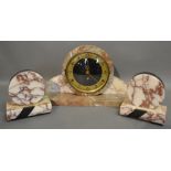 An Art Deco Variegated Marble Three Piec