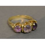 A 14ct. Gold Amethyst Three Stone Ring,