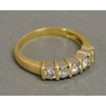 An 18ct. Yellow Gold Five Stone Diamond