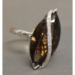 An 18ct. White Gold Citrine and Diamond