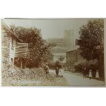 Eldesborough Bucks-Fine RP village street view, church on the hill in the background, locals in