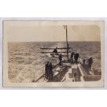 Naval - H.M.S. Cambrian aft view RP with Seaplane in tow. Scarce