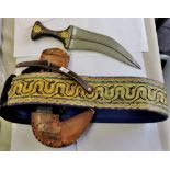 Middle Eastern Jambiya knife on a decorative silver braid belt. A very nice item