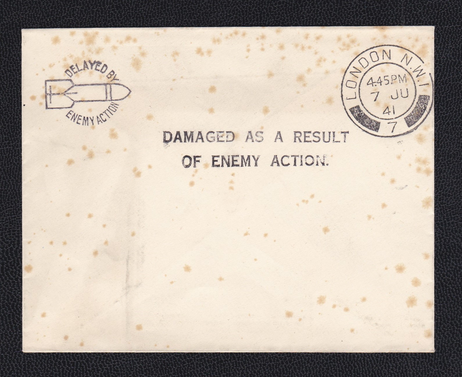 Great Britain 1941 London datestamped unaddressed env with 'Delayed by Enemy Action' handstamp (