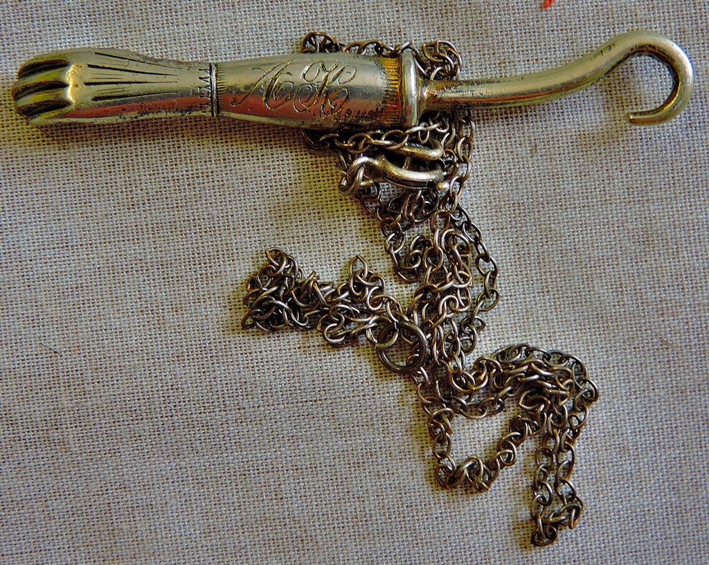 Victorian Silver Plated-Button Hook-engraved AK in the form of a ladies hand with chain