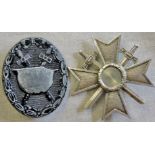 German 1957 De-Nazified awards including: The War Merit and Wound badge 3rd class. Both maker