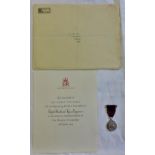 ERII Coronation Medal- with award document to Edgar Rowland Voyce.