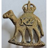 New Zealand-Camel Corps a rare middle east sand cast Lemon Squeezer badge.