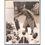 1929 - Press photo of the Prince of Wales representing the King, placing His Majesty's Wreath on the