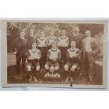 Football/Dorset - Dorchester 1906-1907 Team Real Photo Postcard with Trophies. A rare card