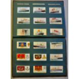 Vintage 'Cigarette Pictures' Slot-in album with Players 'Drum Banners and Cap Badges' set 50/50,