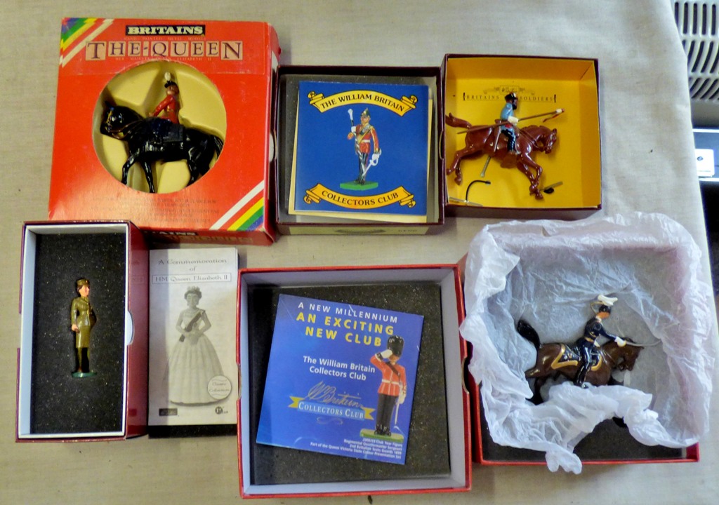 (4) collectable figures-collectable die cast figures all boxed in ex excellent condition