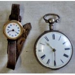 A silver pocket watch and a small gold gereva watch - missing glass (2)