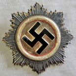 German WWII Cross in Silver, no makers mark. Likely a later remake but a lovely example.