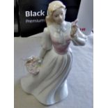 Delightful Figure of lady collecting flowers-no chips-no makers mark-good condition