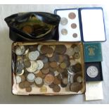 British and Foreign in a tin and old purse etc. (100's)