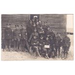 Cambridgeshire Regiment group photo outside a Barrack Hut - good card, scarce Regiment