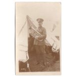 Queen's Regiment WWI RP Musician proudly holds his Euphonium - tented camp.