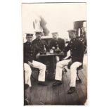 Royal Marines WWI- RP postcard, four marines seated on deck - names on the back