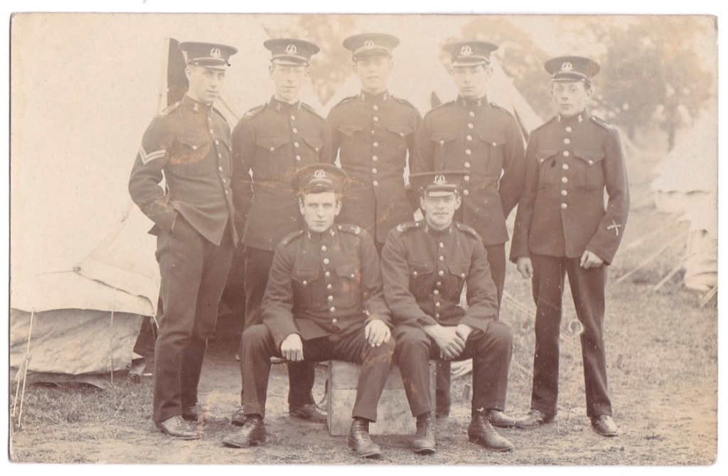 Norfolk Regiment-Fine RP postcard-section of seven with corporal-good card