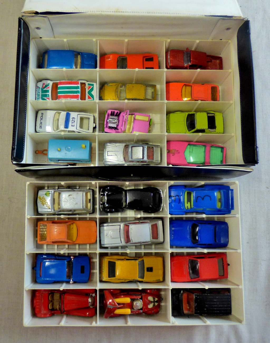 Corgi,Matchbox, etc-collection of (24) mostly racing cars housed in a Mattel Race Case-Playworn some