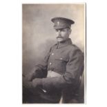 Grenadier Guards WWI Seated Officer portrait photo card in No.2 dress with gloves and swagger