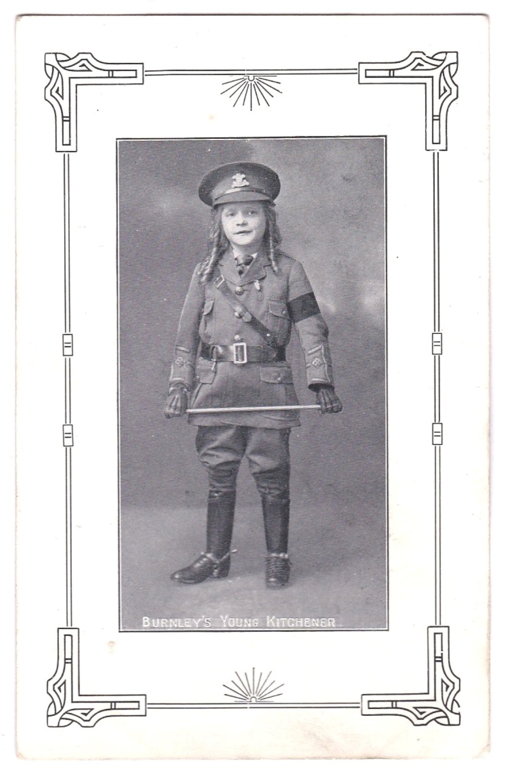 Burney's Young Kitchener photo postcard of a young girl in full service dress-unusual