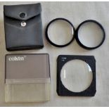 lenses for cameras-one set for canon in clear plastic box-one other set in black plastic