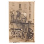 Royal Horse Artillery WWI-RP postcard- Bombardier supervising loading manure onto a large wooden