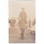 Norfolk Regiment WWI- Photographic camp postcard-one soldier sits on the shoulders of another-