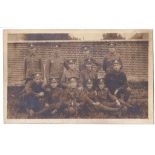 Norfolk RegimentWWI-Fine photographic postcard of section of twelve-bright looking bunch-with mascot