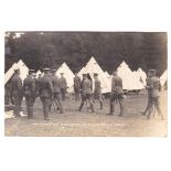 WWI-Bedfordshire regiment-An officer and soldiers with rifles a round a heavy artillery piece-fitted