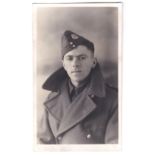 Suffolk Regiment WWII Soldier RP wearing sidecap and greatcoat. Great quality picture