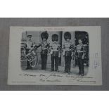 Scots Guards Photo Postcard Bandmaster, Drummer and Bugler etc., five in group, used 1903, U/D