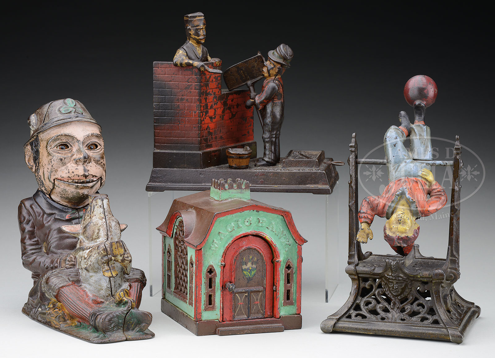 FOUR CAST-IRON MECHANICAL BANKS INCLUDING MASON BANK, BOY ON TRAPEZE, MAGIC BANK, PADDY & THE PIG.