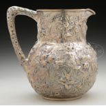 COIN SILVER WATER PITCHER BY KIRK & SON.