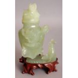 A 20TH CENTURY CHINESE CELADON GREEN CARVED BOWENITE VASE & COVER, together with a fitted carved