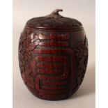 A JAPANESE MEIJI PERIOD WOOD KOGO & COVER, the sides of the barrel-form box carved in relief with