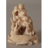 A JAPANESE MEIJI PERIOD IVORY OKIMONO ANIMAL GROUP, carved in the form of two monkeys perched on a