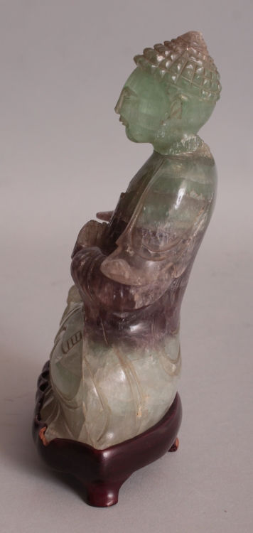 A 20TH CENTURY CHINESE FLUORITE CRYSTAL CARVING OF BUDDHA, together with a fitted wood stand, the - Image 4 of 8