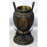 A LARGE & IMPRESSIVE JAPANESE MEIJI PERIOD BRONZE VASE ON INTEGRAL STAND, the sides well cast with