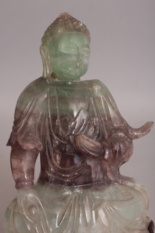 A 20TH CENTURY CHINESE FLUORITE CRYSTAL CARVING OF BUDDHA, together with a fitted wood stand, the - Image 7 of 8