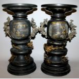 A GOOD PAIR OF JAPANESE MEIJI PERIOD GILT & SILVER INLAID SECTIONAL BRONZE VASES, each base with