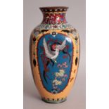 A JAPANESE MEIJI PERIOD SQUARE SECTION CLOISONNE VASE, decorated with alternating panels of